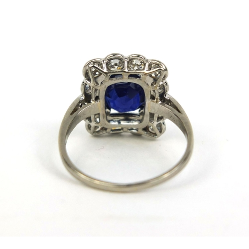 759 - Victorian platinum sapphire and diamond ring set with a central solitaire sapphire surrounded by twe... 