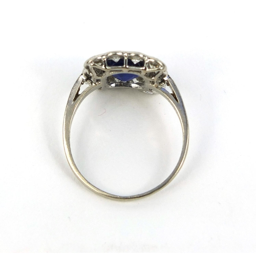 759 - Victorian platinum sapphire and diamond ring set with a central solitaire sapphire surrounded by twe... 