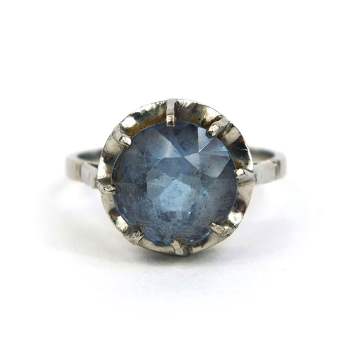 824 - Unmarked platinum blue spinel solitaire ring, size N, approximate weight 4.8g