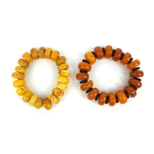 850 - Two Baltic butterscotch amber coloured bead bracelets, approximate weight 76.8g