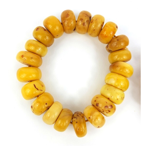 850 - Two Baltic butterscotch amber coloured bead bracelets, approximate weight 76.8g