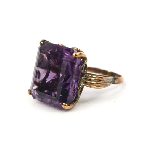 839 - Unmarked gold large square amethyst ring, size N, approximate weight 8.9g