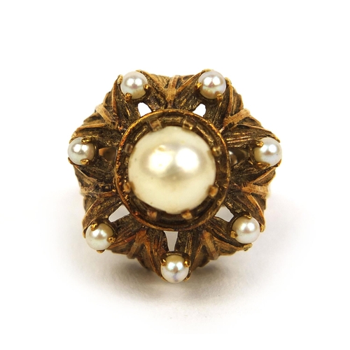 810 - Unmarked gold naturalistic pearl ring set with eight pearls, size L, approximate weight 12.0g