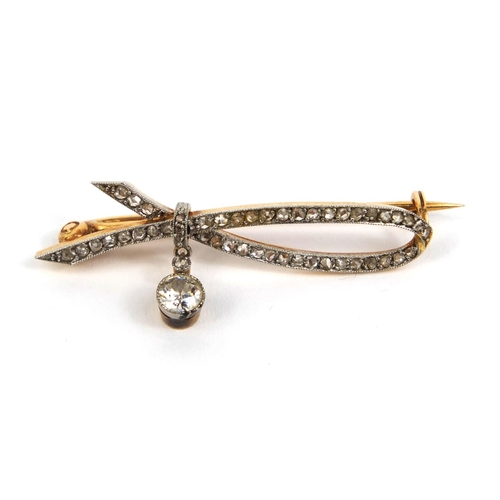 798 - Unmarked gold diamond and clear sapphire bar brooch, 4cm long, approximate weight 3.2g