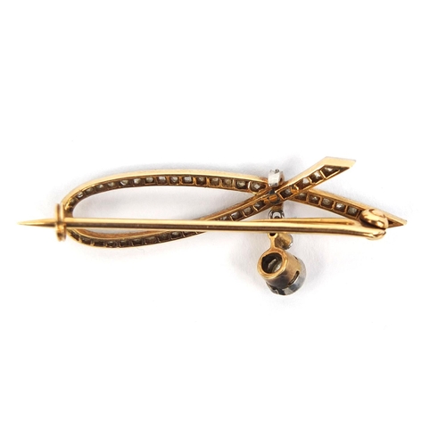 798 - Unmarked gold diamond and clear sapphire bar brooch, 4cm long, approximate weight 3.2g