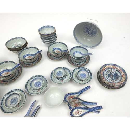 192 - Selection of Chinese hand painted blue and white china to include rice bowls, soup bowls, spoons etc