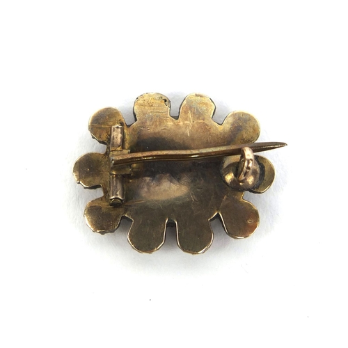 818 - Unmarked gold garnet and seed pearl mourning brooch, approximately 2cm long, approximate weight 2.6g