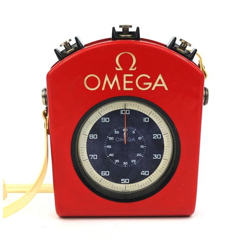 872 - Vintage Omega gunmetal stopwatch, No.1837576 to the movement, housed in a bakelite Omega case, possi... 