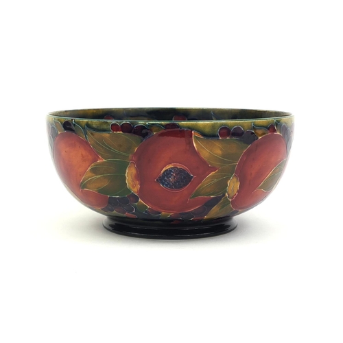 620 - William Moorcroft pomegranate pattern bowl, with hand painted and tube lined decoration, painted gre... 