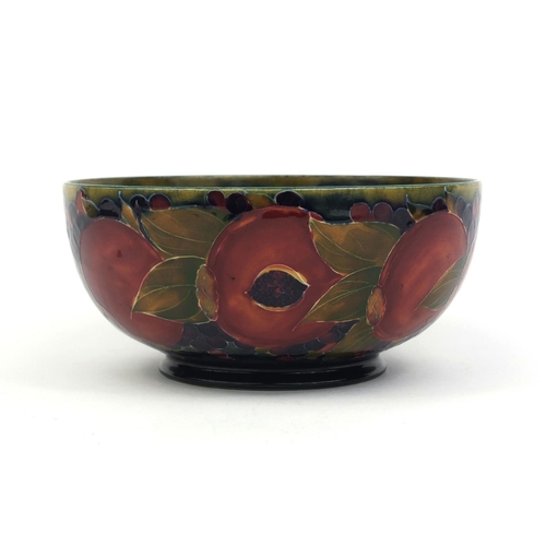 620 - William Moorcroft pomegranate pattern bowl, with hand painted and tube lined decoration, painted gre... 