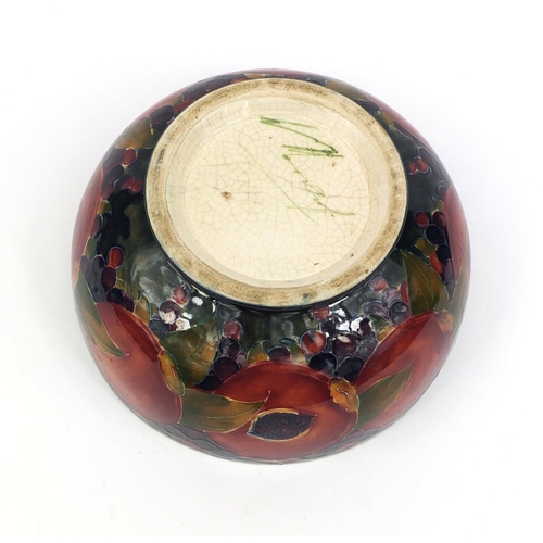 620 - William Moorcroft pomegranate pattern bowl, with hand painted and tube lined decoration, painted gre... 