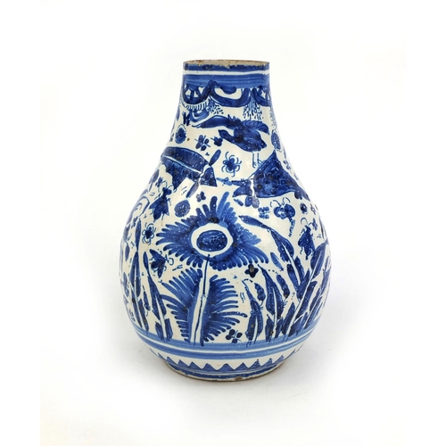 564 - Continental blue and white pottery vase, hand painted with birds and insects amongst flowers and fol... 