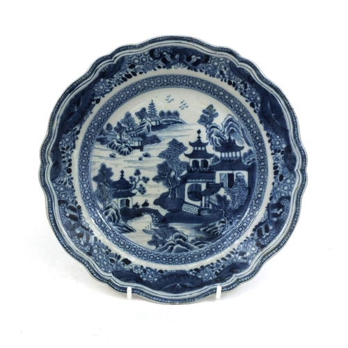 396 - 18th century Chinese blue and white porcelain plate, hand painted with a river landscape within a fo... 