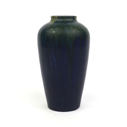 607 - Art pottery vase decorated with a yellow and green running glaze onto a cobalt blue ground, possibly... 