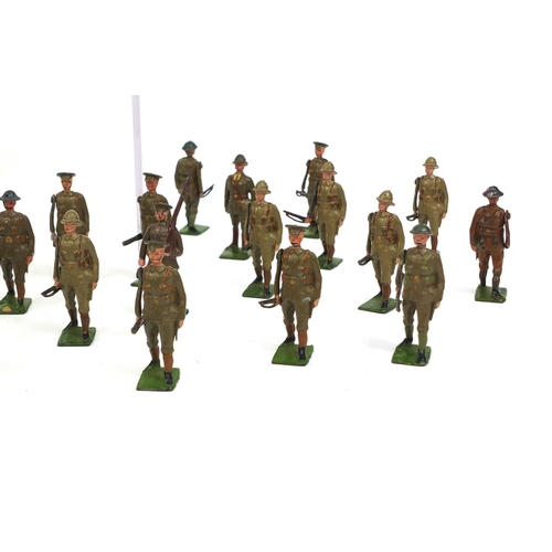 257 - Large collection of mostly Britain's hand painted lead soldiers including drummers, mostly with move... 