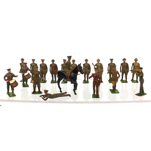 257 - Large collection of mostly Britain's hand painted lead soldiers including drummers, mostly with move... 