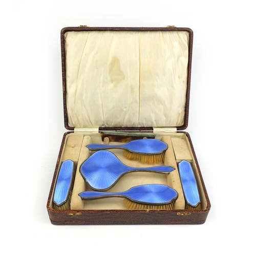 718 - Cased silver five piece dressing table set with blue guilloche enamel decoration, E & Co Birmingham ... 