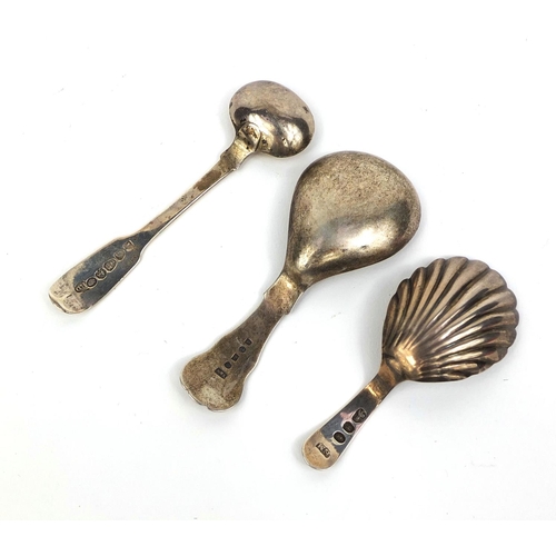 729 - Silver spoons comprising Georgian caddy spoon with shell shaped bow, Georgian mustard spoon and Vict... 