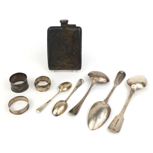 721 - Silver items comprising two large Georgian spoons, Georgian ladle, hip flask, three napkin rings and... 