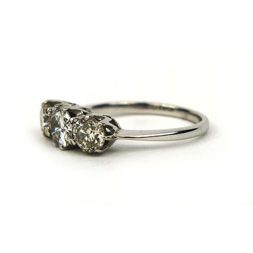 781 - 18ct white gold three stone ring, size J, approximate weight 1.7g