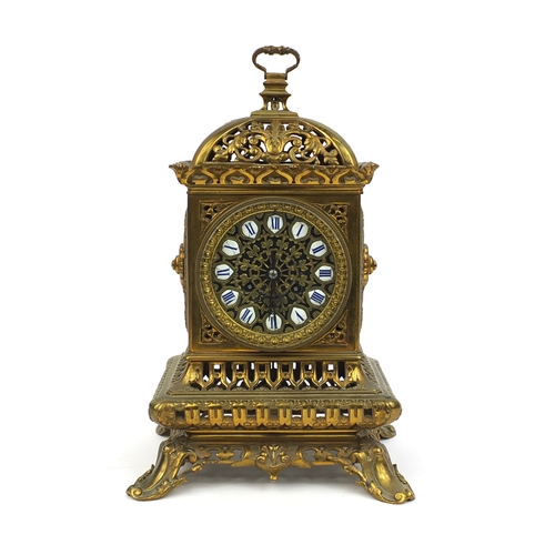 736 - 19th century gilt brass gothic mantle clock by Charles M T with pierced and floral decoration and en... 