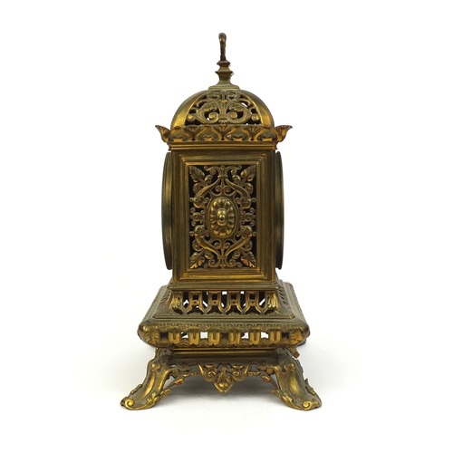 736 - 19th century gilt brass gothic mantle clock by Charles M T with pierced and floral decoration and en... 