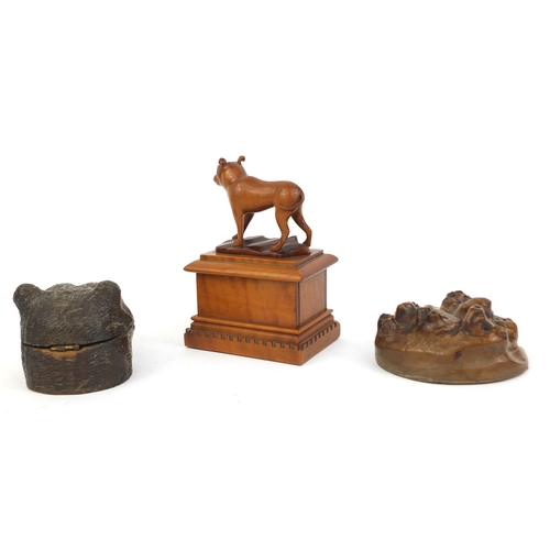 22 - Group of treen including black forest bears head stamp box and a carved yew wood study of a mastiff,... 