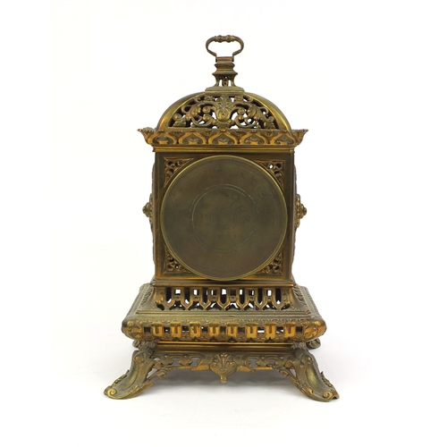 736 - 19th century gilt brass gothic mantle clock by Charles M T with pierced and floral decoration and en... 