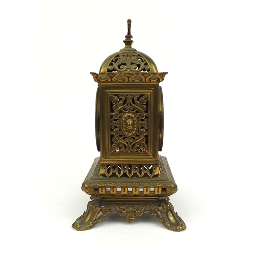 736 - 19th century gilt brass gothic mantle clock by Charles M T with pierced and floral decoration and en... 