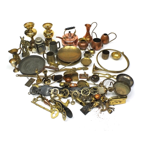 130 - Large selection of brass and copper items including horse brasses, hunting horn, jugs, lanterns, fir... 