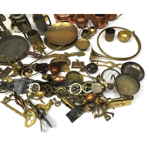 130 - Large selection of brass and copper items including horse brasses, hunting horn, jugs, lanterns, fir... 