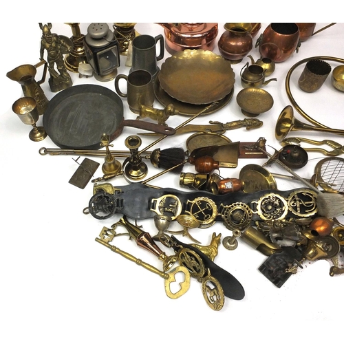 130 - Large selection of brass and copper items including horse brasses, hunting horn, jugs, lanterns, fir... 