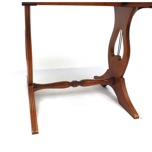 37 - Inlaid yew wood drop leaf table on lyre supports, 52cm high x 47cm wide (folded) x 38cm deep