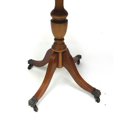 63 - Circular inlaid yew wood occasional table, 52cm high x 57cm in diameter