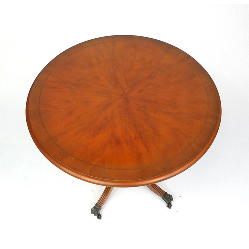 63 - Circular inlaid yew wood occasional table, 52cm high x 57cm in diameter