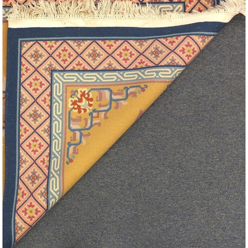 36 - Blue and beige ground floral rug, 230cm x 122cm
