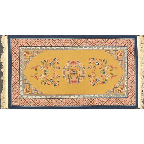 36 - Blue and beige ground floral rug, 230cm x 122cm