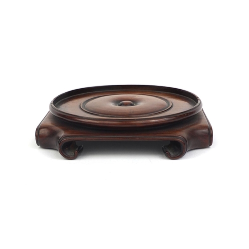 476 - Chinese hardwood stand with stylised scrolled feet, 13.5cm x 13.5cm