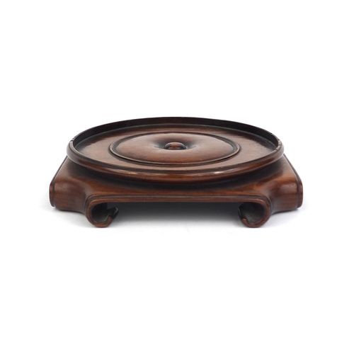 476 - Chinese hardwood stand with stylised scrolled feet, 13.5cm x 13.5cm