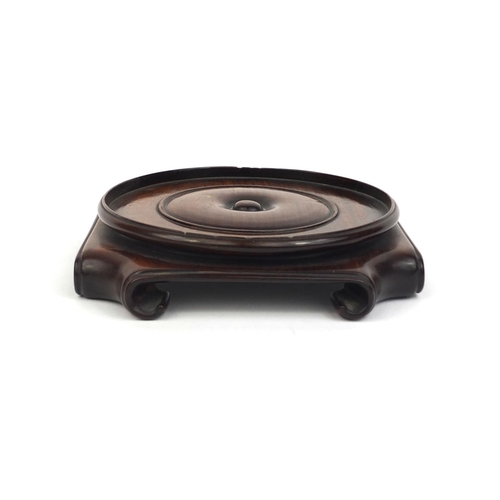 476 - Chinese hardwood stand with stylised scrolled feet, 13.5cm x 13.5cm