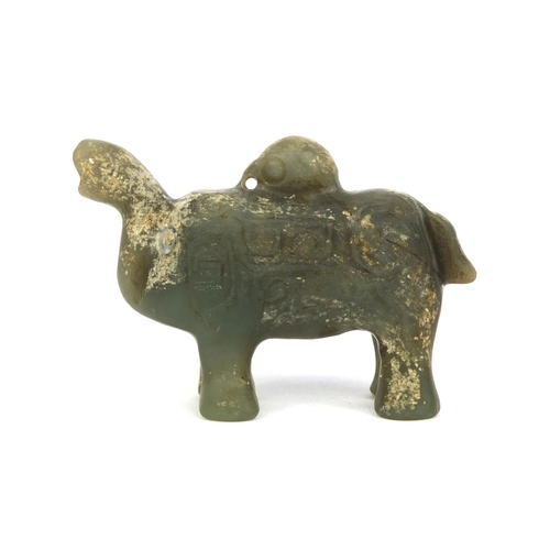 436 - Chinese carved green jade elephant pendant with incised stylised decoration, possibly Ming dynasty o... 