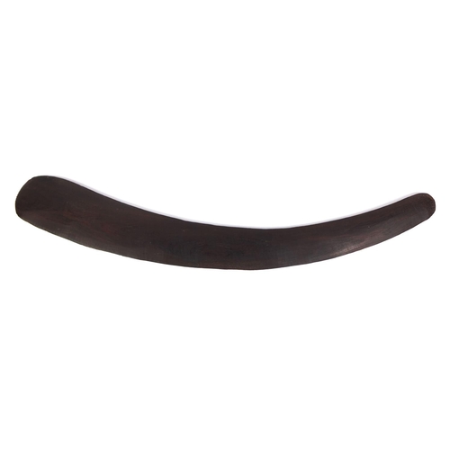 506 - Australian aboriginal interest wooden boomerang with carved decoration, 53cm long