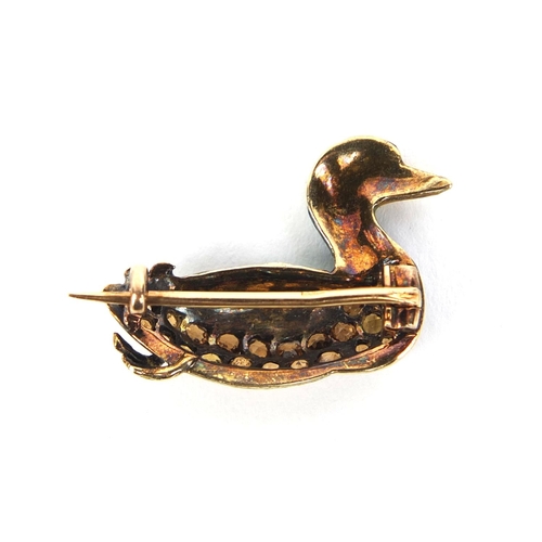 847 - Oriental gold coloured metal and enamel duck brooch set with colourful glass stones, indistinct stam... 