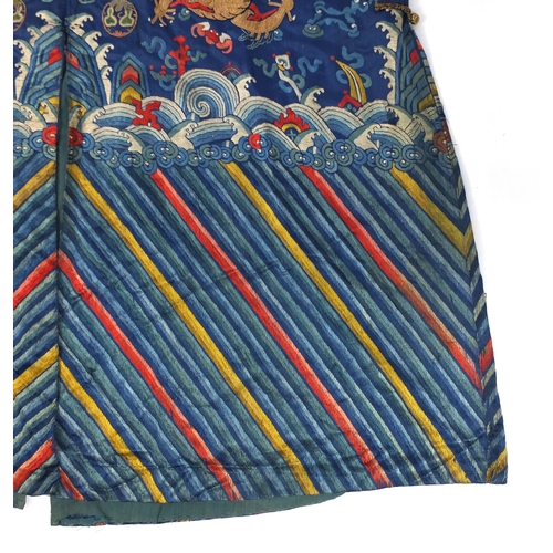 481 - Chinese silk blue ground dragon robe, profusely embroidered with dragons amongst clouds and bats, ab... 