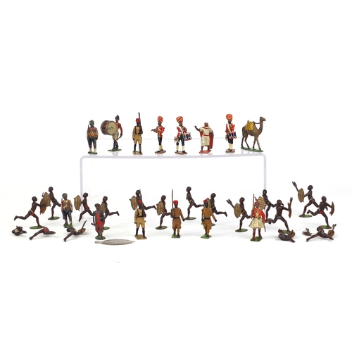 256 - Group of mostly Britain's hand painted lead soldiers and Zulu warriors including some with moveable ... 