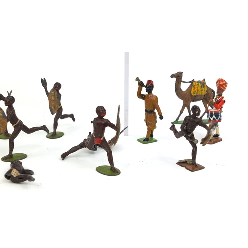 256 - Group of mostly Britain's hand painted lead soldiers and Zulu warriors including some with moveable ... 