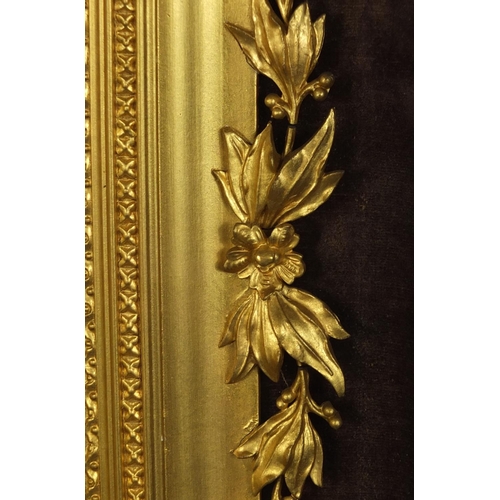 108 - Good 19th century gilt frame with swag and floral decoration, housed in a velvet lined rosewood fram... 