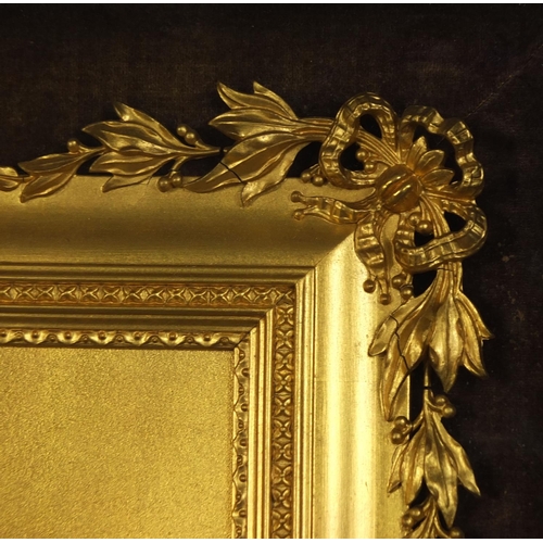 108 - Good 19th century gilt frame with swag and floral decoration, housed in a velvet lined rosewood fram... 