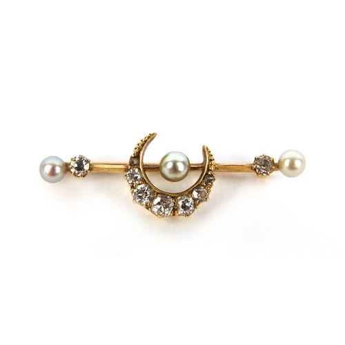 800 - Unmarked gold diamond and pearl moon crest bar brooch set with nine diamonds and three pearls, 3.5cm... 