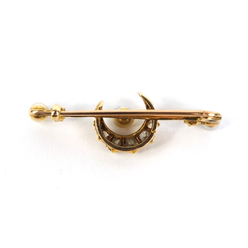 800 - Unmarked gold diamond and pearl moon crest bar brooch set with nine diamonds and three pearls, 3.5cm... 